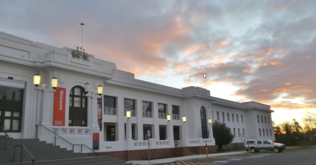 Roof Repairs Canberra team servicing a large building, facing imminent repair in Canberra.